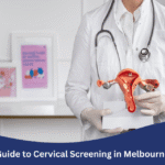 Doctor holding a uterus model during a cervical screening consultation in Melbourne.